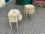 A pair of antique French hand painted bedside cabinets