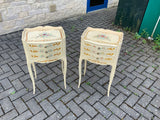 A pair of antique French hand pained bedside cabinets
