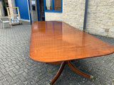 Vintage English Mahogany Three Pillar Table and Sixteen Chairs