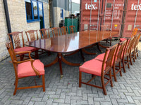 Vintage English Mahogany Three Pillar Table and Sixteen Chairs