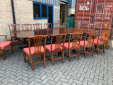 Vintage English Mahogany Three Pillar Table and Sixteen Chairs
