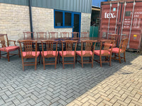 Vintage English Mahogany Three Pillar Table and Sixteen Chairs