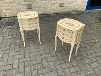 A pair of antique French hand painted bedside cabinets