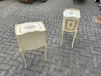 A pair of antique French hand painted bedside cabinets