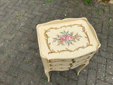 A pair of antique French hand painted bedside cabinets