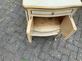 A pair of antique Italian hand painted bedside cabinets