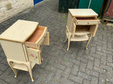 A pair of antique Italian hand painted bedside cabinets