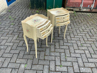 A pair of antique French hand pained bedside cabinets