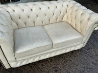 Pair of English Vintage Small Leather Chesterfield Sofas